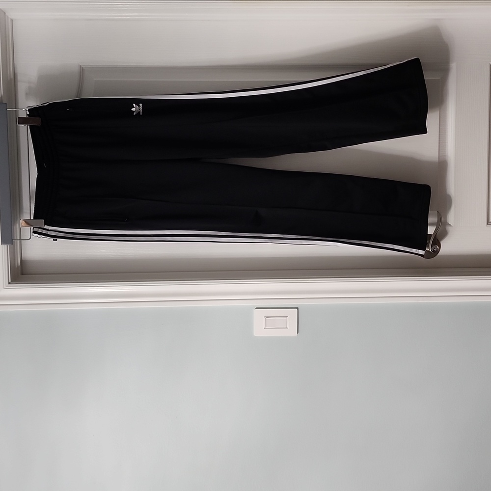 55. Black adidas straight leg pants